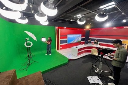 Green Screen Studio with Ring Light and Camera Setup
