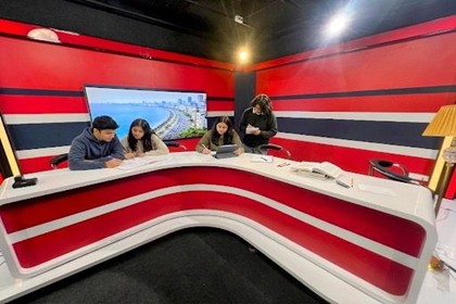 Modern News Studio Desk with Red and White Design